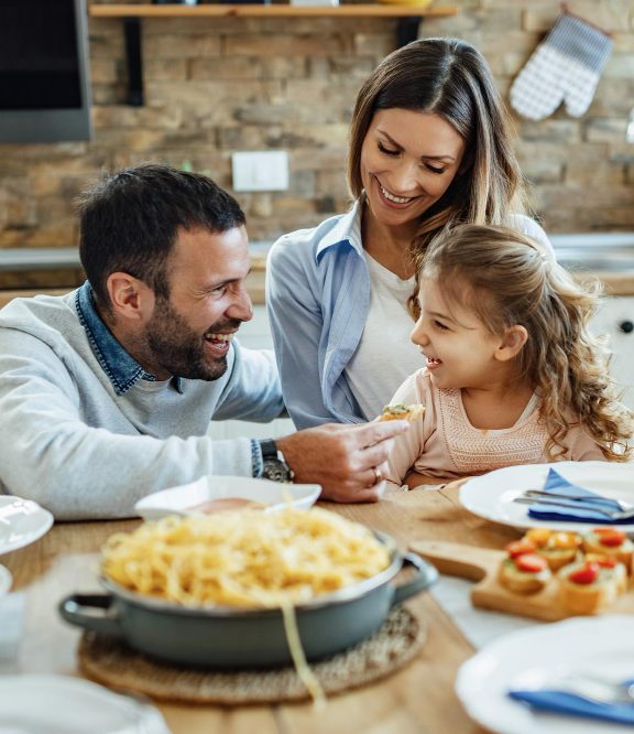 happy-parents-theirs-mall-daughter-having-fun-during-family-lunch-home