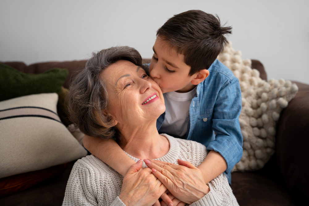 medium-shot-grandson-kissing-grandmother